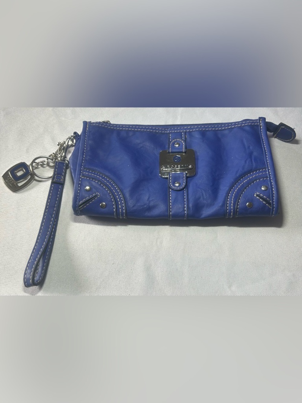 Rosetti Royal Blue Leather Wristlet Clutch with Metal Logo Plate